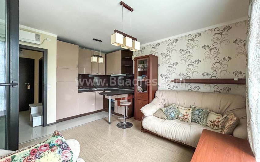 To buy an apartment with a low maintenance fee in Sunny Beach