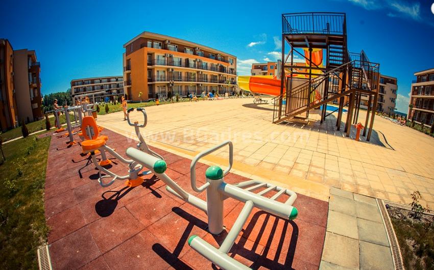 To buy an apartment with a low maintenance fee in Sunny Beach
